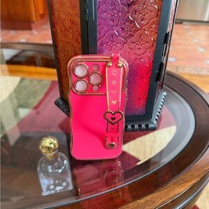 iPhone 16 Pro Stylish Pink Phone Case with Heart Design